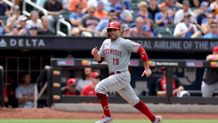 Cincinnati Reds first baseman Joey Votto (19) scores on a sacrifice fly by left fielder Jake Fraley (not pictured) during the fourth inning against the New York Mets at Citi Field