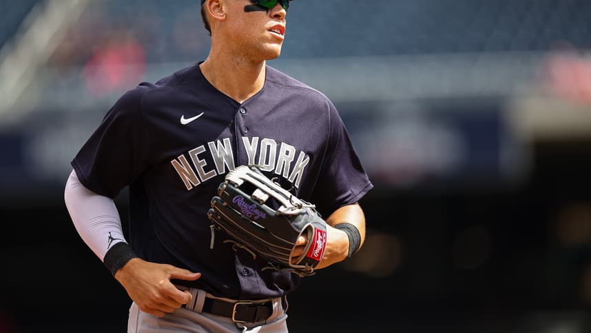 New York Yankees center fielder Aaron Judge (99) looks on against the Washington Nationals during the second inning of the Spring Training game at Nationals Park