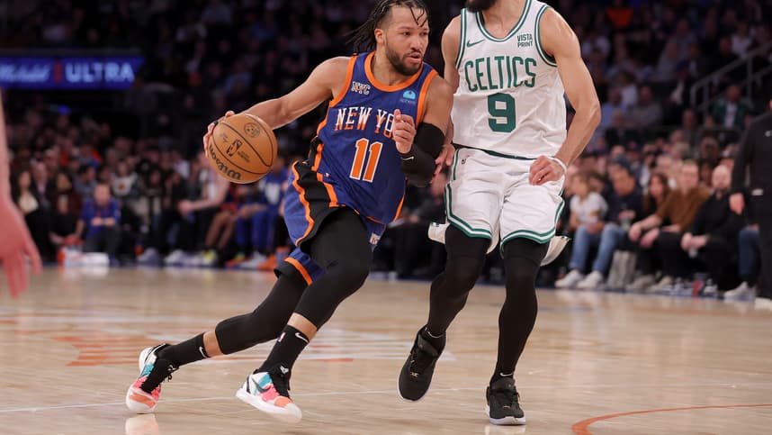 New York Knicks guard Jalen Brunson (11) drives to the basket against Boston Celtics guard Derrick White (9) during the third quarter at Madison Square Garden