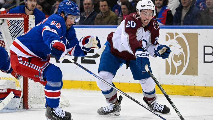 New York Rangers defenseman Erik Gustafsson (56) and Colorado Avalanche center Ross Colton (20) battle over the puck during the second period at Madison Square Garden