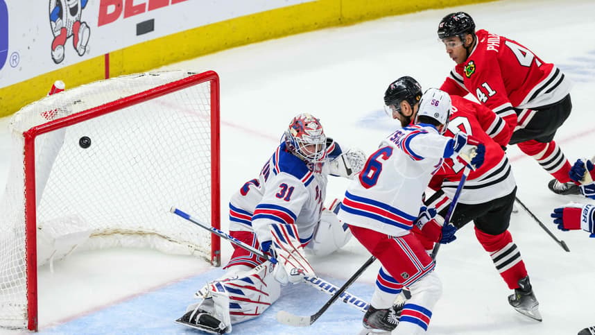 Chicago Blackhawks left wing Nick Foligno (17) scores past New York Rangers goaltender Igor Shesterkin (31) during the third period at the United Center