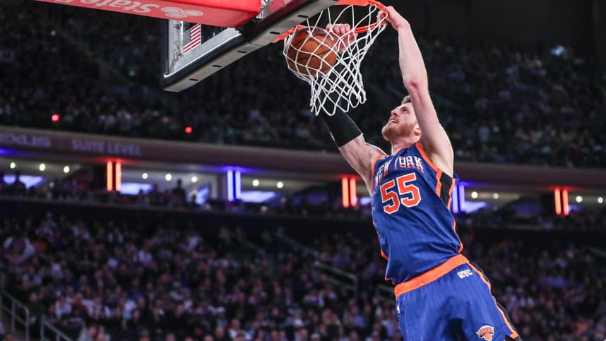 New York Knicks center Isaiah Hartenstein (55) dunks in the fourth quarter against the Brooklyn Nets at Madison Square Garden
