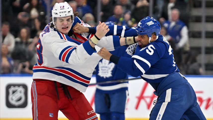 Toronto Maple Leafs forward Ryan Reaves (75) lands a punch as he fights with New York Rangers forward Matt Rempe (73) in the third period at Scotiabank Arena