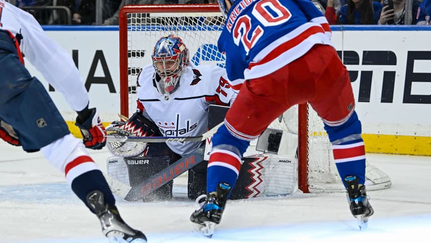 Apr 23, 2024; New York, New York, USA;  Washington Capitals goaltender Charlie Lindgren (79) makes a save on New York Rangers left wing Chris Kreider (20) during the third period in game two of the first round of the 2024 Stanley Cup Playoffs at Madison Square Garden. Mandatory Credit: Dennis Schneidler-USA TODAY Sports
