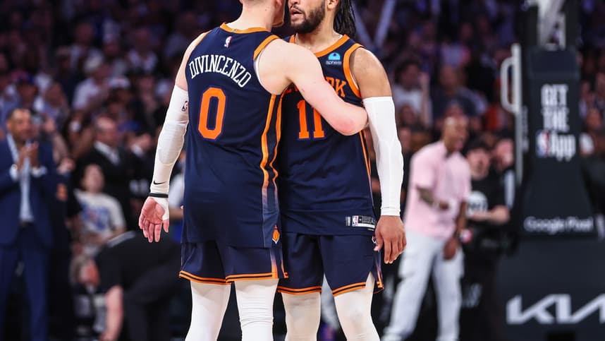 May 8, 2024; New York, New York, USA; New York Knicks guards Donte DiVincenzo (0) and Jalen Brunson (11) embrace after defeating the Indiana Pacers 130-121 in game two of the second round for the 2024 NBA playoffs at Madison Square Garden. Mandatory Credit: Wendell Cruz-USA TODAY Sports