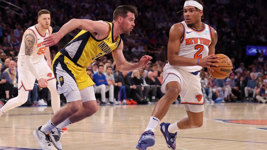 May 19, 2024; New York, New York, USA; New York Knicks guard Miles McBride (2) drives to the basket against Indiana Pacers guard T.J. McConnell (9) during the fourth quarter of game seven of the second round of the 2024 NBA playoffs at Madison Square Garden. Mandatory Credit: Brad Penner-USA TODAY Sports