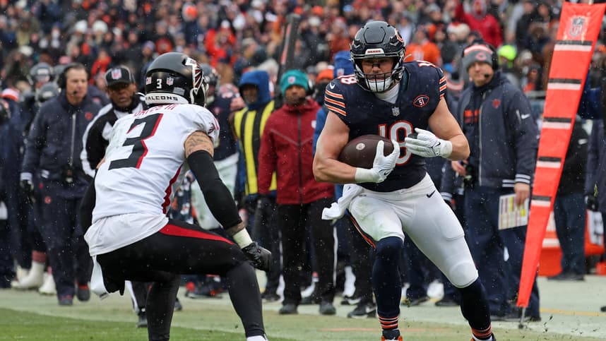 Dec 31, 2023; Chicago, Illinois, USA; Chicago Bears tight end Robert Tonyan (New York Giants FA target) (18) makes a catch against Atlanta Falcons safety Jessie Bates III (3) during the first half at Soldier Field. Mandatory Credit: Mike Dinovo-USA TODAY Sports