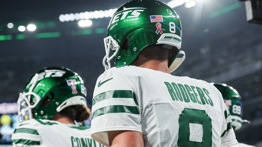 Sep 11, 2023; East Rutherford, New Jersey, USA; New York Jets quarterback Aaron Rodgers (8) walks on the field at MetLife Stadium before the game against the Buffalo Bills. Mandatory Credit: Vincent Carchietta-USA TODAY Sports