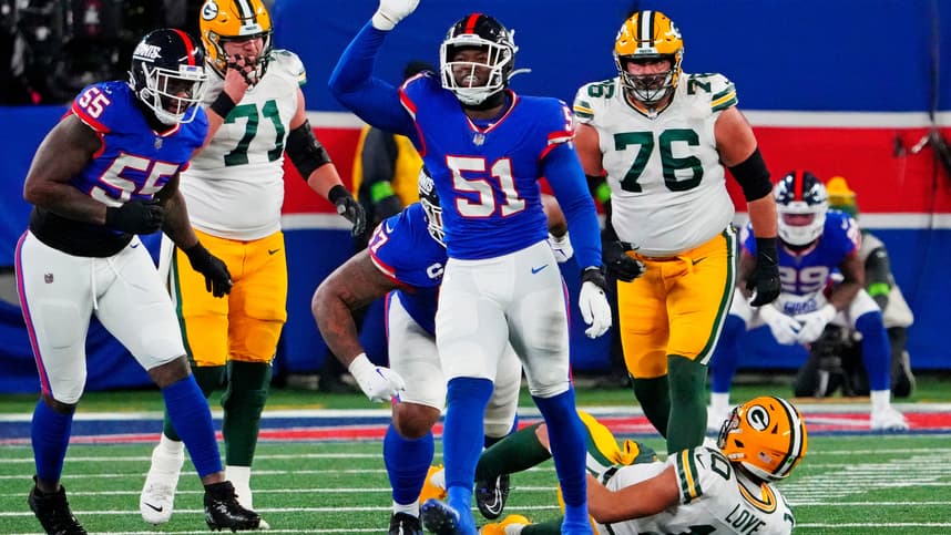 Dec 11, 2023; East Rutherford, New Jersey, USA; New York Giants linebacker Azeez Ojulari (51) celebrates after making a sack on Green Bay Packers quarterback Jordan Love (10) during the fourth quarter at MetLife Stadium. Mandatory Credit: Robert Deutsch-USA TODAY Sports