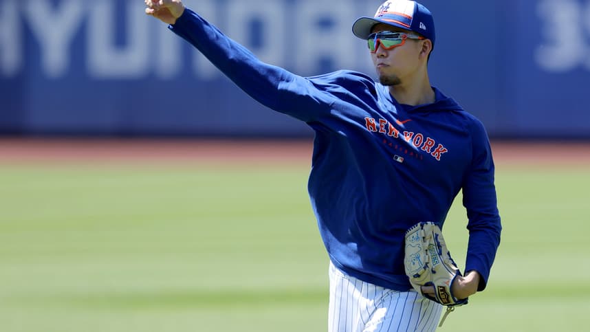 Jun 1, 2024; New York City, New York, USA; New York Mets injured starting pitcher Kodai Senga (34) throws a baseball in the outfield before a game against the Arizona Diamondbacks at Citi Field. Mandatory Credit: Brad Penner-USA TODAY Sports