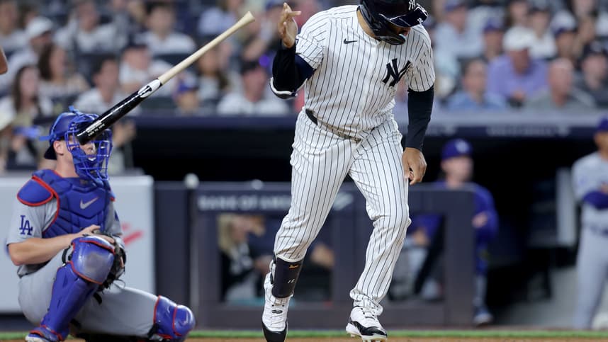 Jun 9, 2024; Bronx, New York, USA; New York Yankees center fielder Trent Grisham (12) tosses his bat after hitting a three run home run against the Los Angeles Dodgers during the sixth inning at Yankee Stadium. Mandatory Credit: Brad Penner-USA TODAY Sports