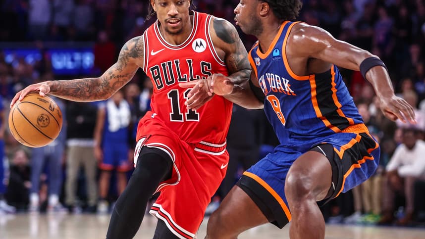 Apr 14, 2024; New York, New York, USA;  Chicago Bulls forward DeMar DeRozan (11) looks to drive past New York Knicks forward OG Anunoby (8) in the fourth quarter at Madison Square Garden. Mandatory Credit: Wendell Cruz-USA TODAY Sports