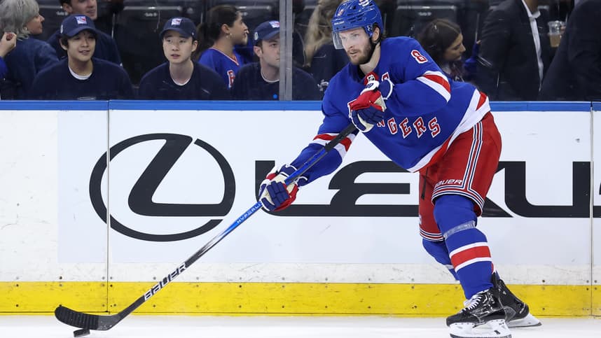 May 22, 2024; New York, New York, USA; New York Rangers defenseman Jacob Trouba (8) controls the puck against the Florida Panthers during the third period of game one of the Eastern Conference Final of the 2024 Stanley Cup Playoffs at Madison Square Garden. Mandatory Credit: Brad Penner-USA TODAY Sports