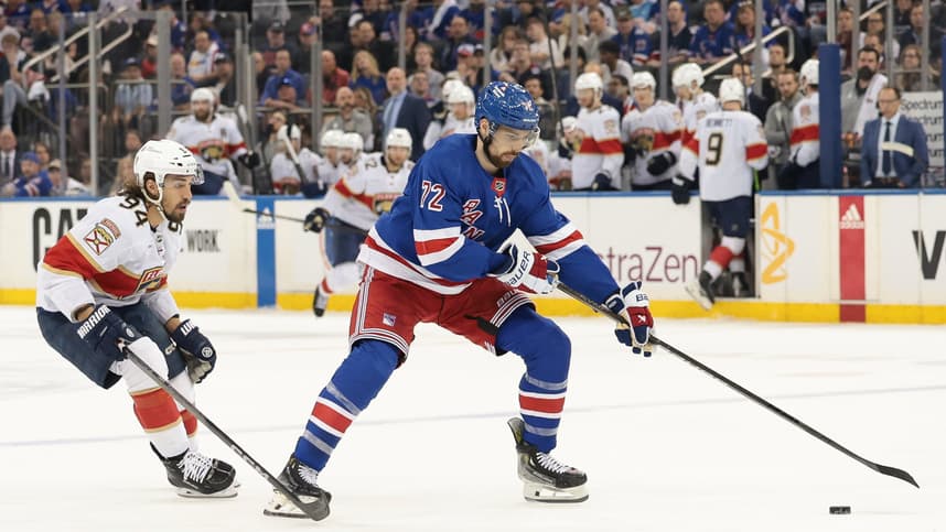 May 24, 2024; New York, New York, USA;  New York Rangers center Filip Chytil (72) plays the puck in front of Florida Panthers left wing Ryan Lomberg (94) during the first period in game two of the Eastern Conference Final of the 2024 Stanley Cup Playoffs at Madison Square Garden. Mandatory Credit: Vincent Carchietta-USA TODAY Sports