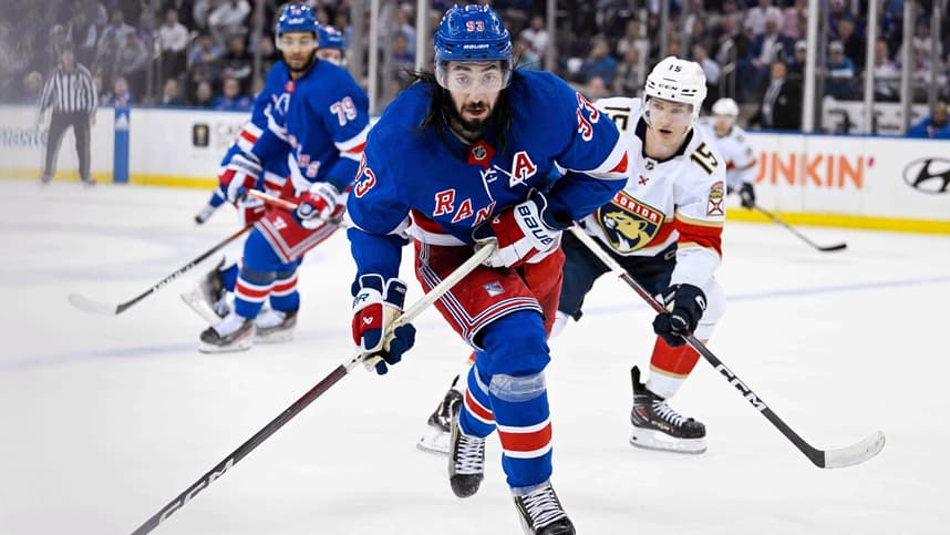 May 30, 2024; New York, New York, USA; New York Rangers center Mika Zibanejad (93) skates with the puck against the Florida Panthers during the third period in game five of the Eastern Conference Final of the 2024 Stanley Cup Playoffs at Madison Square Garden. Mandatory Credit: Dennis Schneidler-USA TODAY Sports