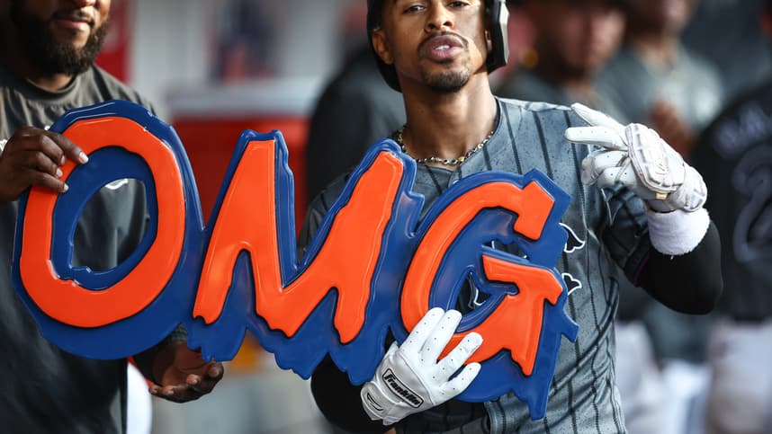 Jul 13, 2024; New York City, New York, USA; New York Mets shortstop Francisco Lindor (12) celebrates in the dugout after hitting a three run home run in the eighth inning against the Colorado Rockies at Citi Field. Mandatory Credit: Wendell Cruz-USA TODAY Sports