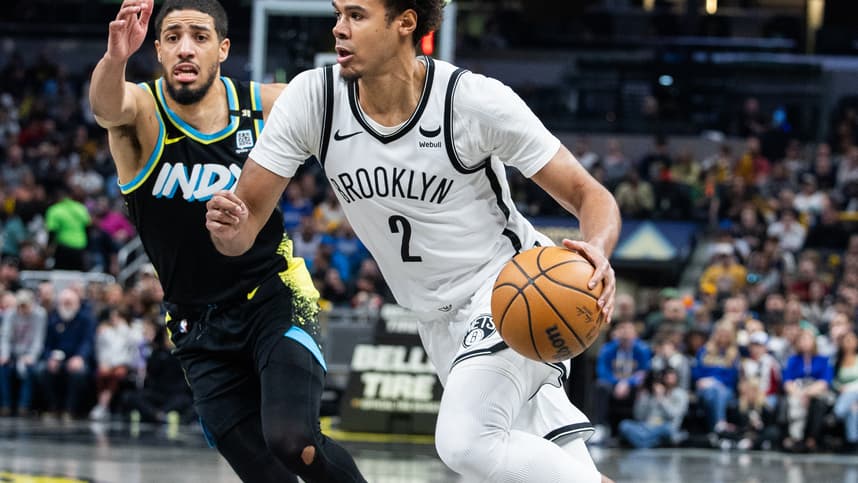 Mar 16, 2024; Indianapolis, Indiana, USA; Brooklyn Nets forward Cameron Johnson (2) dribbles the ball while Indiana Pacers guard Tyrese Haliburton (0) defends in the second half at Gainbridge Fieldhouse. Mandatory Credit: Trevor Ruszkowski-USA TODAY Sports