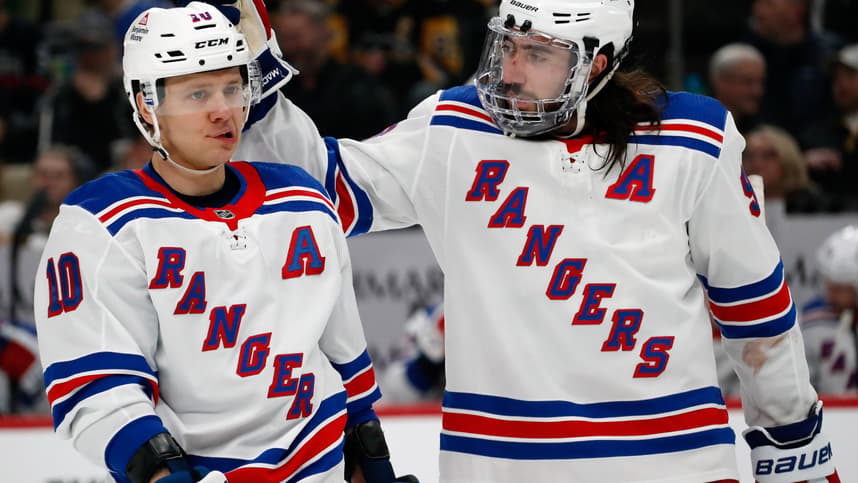 Mar 16, 2024; Pittsburgh, Pennsylvania, USA;  New York Rangers left wing Artemi Panarin (10) and center Mika Zibanejad (93) talk on the ice against the Pittsburgh Penguins during the second period at PPG Paints Arena. Mandatory Credit: Charles LeClaire-USA TODAY Sports