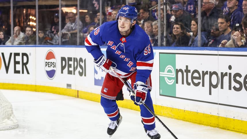 Apr 21, 2024; New York, New York, USA; New York Rangers defenseman Ryan Lindgren (55) controls the puck in the third period against the Washington Capitals in game one of the first round of the 2024 Stanley Cup Playoffs at Madison Square Garden. Mandatory Credit: Wendell Cruz-USA TODAY Sports