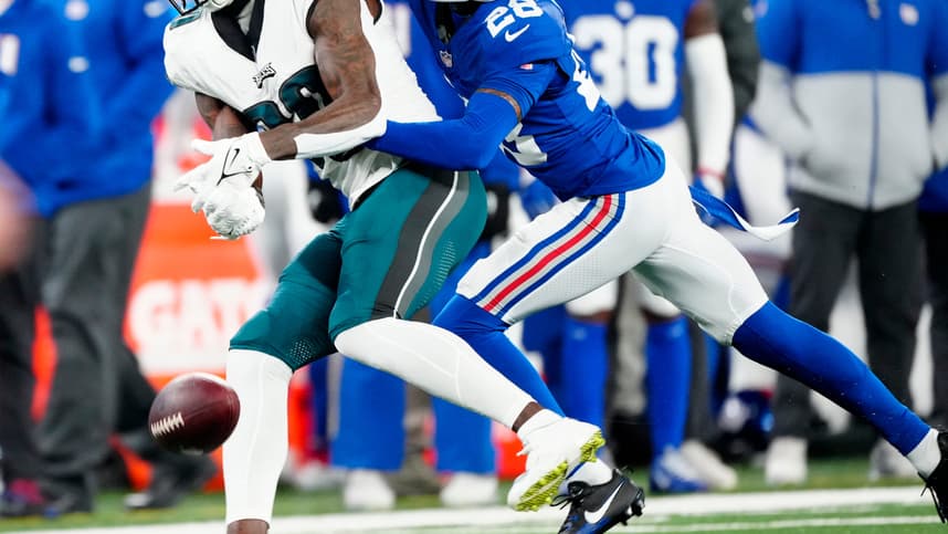 New York Giants cornerback Cor'Dale Flott (28) makes sure Philadelphia Eagles wide receiver Julio Jones (80) does not complete a second quarter pass, Sunday, January 7, 2024.