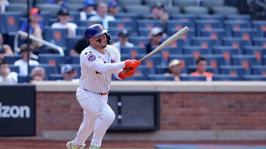 Jul 31, 2024; New York City, New York, USA; New York Mets catcher Francisco Alvarez (4) follows through on an RBI ground out during the ninth inning against the Minnesota Twins at Citi Field. Mandatory Credit: Brad Penner-USA TODAY Sports