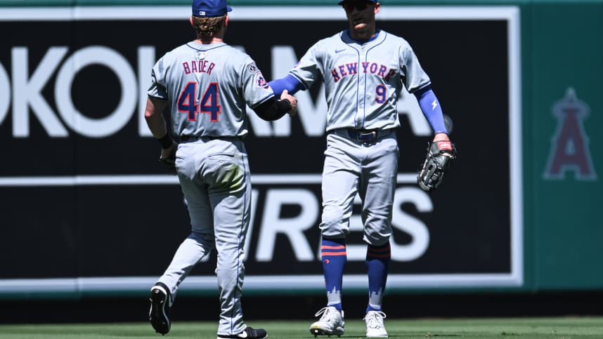 Aug 4, 2024; Anaheim, California, USA; during the New York Mets outfielder Harrison Bader (44) celebrates with outfielder Brandon Nimmo (9) after making a catch during the fifth inning at Angel Stadium. Mandatory Credit: Jonathan Hui-USA TODAY Sports