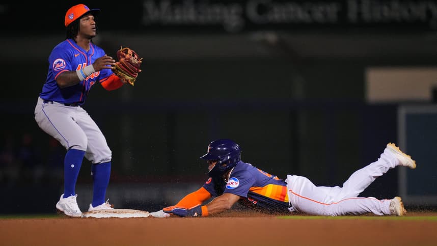 Feb 29, 2024; West Palm Beach, Florida, USA;  Houston Astros outfielder Pedro Leon steals second base as New York Mets second baseman Luisangel Acuna (73) waits for the ball in the seventh inning at The Ballpark of the Palm Beaches. Mandatory Credit: Jim Rassol-USA TODAY Sports
