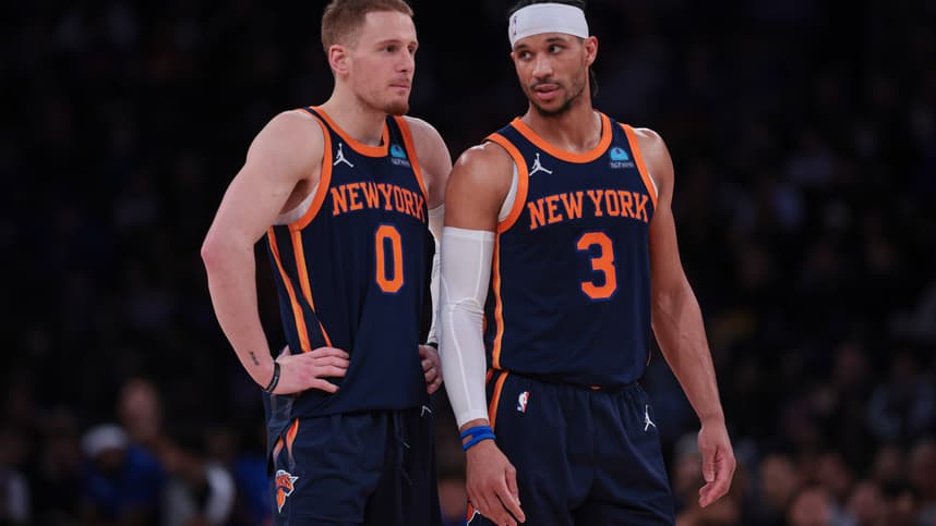Apr 12, 2024; New York, New York, USA; New York Knicks guard Donte DiVincenzo (0) talks with guard Josh Hart (3) during the second half against the Brooklyn Nets at Madison Square Garden. Mandatory Credit: Vincent Carchietta-USA TODAY Sports