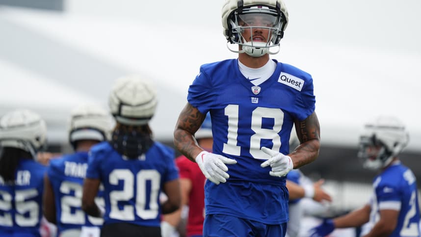 Jul 25, 2024; East Rutherford, NY, USA; New York Giants wide receiver Isaiah Hodgins (18) jogs onto the field during training camp at Quest Diagnostics Training Center. Mandatory Credit: Lucas Boland-USA TODAY Sports