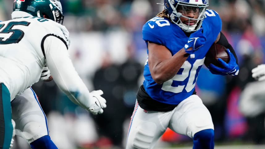 New York Giants running back Eric Gray (20) runs with the ball in the fourth quarter, Sunday, January 7, 2024.