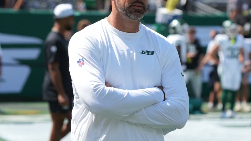 East Rutherford, NJ -- August 10, 2024 -- Aaron Rodgers, who wasn't dressed to play, during pre game warm ups as the Washington Commanders came to MetLife Stadium to play the New York Jets in the first preseason game of the 2024 season.
