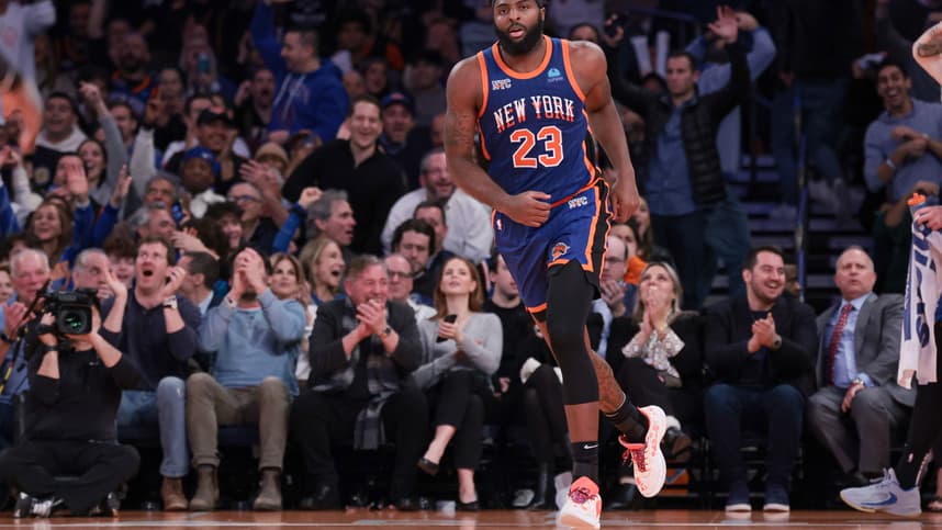 Nov 28, 2023; New York, New York, USA; New York Knicks center Mitchell Robinson (23) reacts after a dunk during the second half against the Charlotte Hornets at Madison Square Garden. Mandatory Credit: Vincent Carchietta-Imagn Images