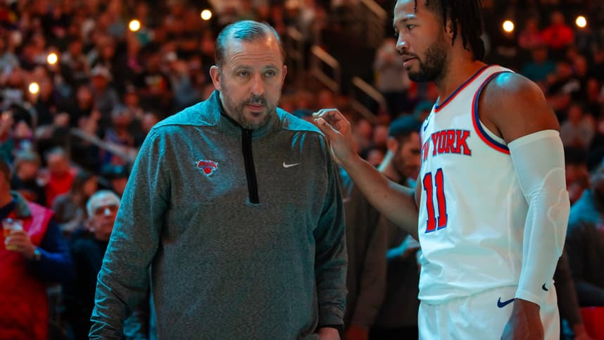 Nov 20, 2022; Phoenix, Arizona, USA; New York Knicks head coach Tom Thibodeau with guard Jalen Brunson (11) against the Phoenix Suns at Footprint Center. Mandatory Credit: Mark J. Rebilas-Imagn Images