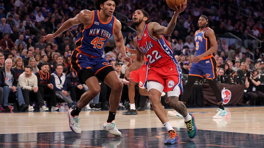Mar 10, 2024; New York, New York, USA; Philadelphia 76ers guard Cameron Payne (22) drives to the basket against New York Knicks center Jericho Sims (45) and forward Precious Achiuwa (5) during the second quarter at Madison Square Garden. Mandatory Credit: Brad Penner-USA TODAY Sports
