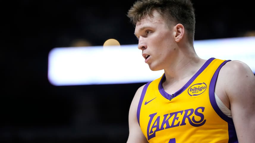 Jul 12, 2024; Las Vegas, NV, USA;  Los Angeles Lakers forward Dalton Knecht (4) competes during the first half against the Houston Rockets at the Thomas & Mack Center. Mandatory Credit: Lucas Peltier-Imagn Images