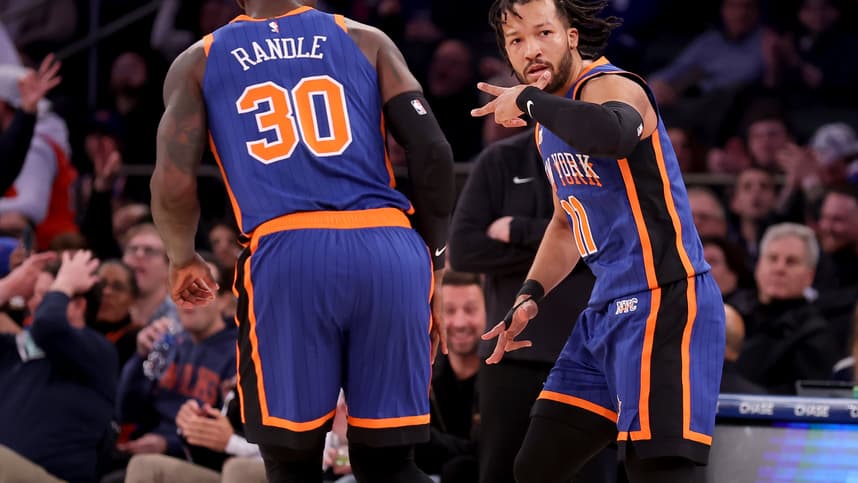 Jan 20, 2024; New York, New York, USA; New York Knicks guard Jalen Brunson (11) celebrates his three point shot against the Toronto Raptors with forward Julius Randle (30) during the first quarter at Madison Square Garden. Mandatory Credit: Brad Penner-Imagn Images