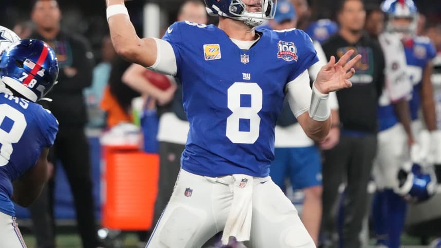 Sep 26, 2024; East Rutherford, New Jersey, USA;  New York Giants quarterback Daniel Jones (8) throws against the Dallas defense during the first half at MetLife Stadium. Mandatory Credit: Robert Deutsch-Imagn Images