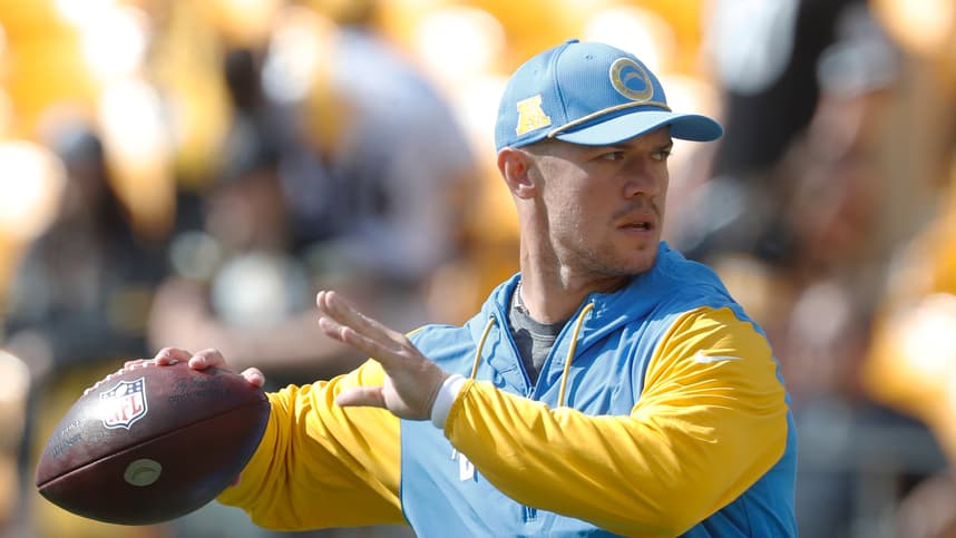 Sep 22, 2024; Pittsburgh, Pennsylvania, USA;  Los Angeles Chargers quarterback Taylor Heinicke (8) warms up against the Pittsburgh Steelers at Acrisure Stadium. Mandatory Credit: Charles LeClaire-Imagn Images