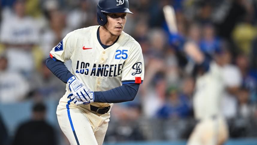 Sep 21, 2024; Los Angeles, California, USA; Los Angeles Dodgers outfielder Tommy Edman (25) walks against the Colorado Rockies during the ninth inning at Dodger Stadium. Mandatory Credit: Jonathan Hui-Imagn Images