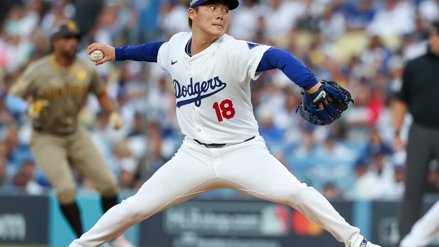 Oct 5, 2024; Los Angeles, California, USA; Los Angeles pitcher Yoshinobu Yamamoto (18) throws a pitch in the first inning against the San Diego Padres during game one of the NLDS for the 2024 MLB Playoffs at Dodger Stadium. Mandatory Credit: Kiyoshi Mio-Imagn Images