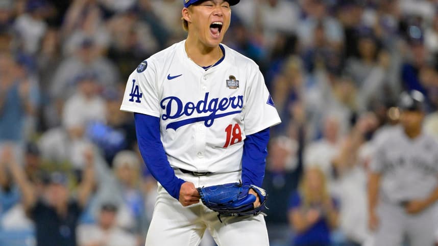 Oct 26, 2024; Los Angeles, California, USA; Los Angeles Dodgers pitcher Yoshinobu Yamamoto (18) reacts in the sixth inning against the New York Yankees during game two of the 2024 MLB World Series at Dodger Stadium. Mandatory Credit: Jayne Kamin-Oncea-Imagn Images