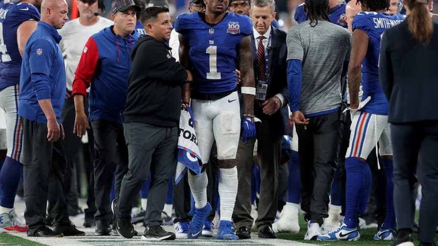 Sep 26, 2024; East Rutherford, New Jersey, USA; New York Giants wide receiver Malik Nabers (1) is helped off the field after an injury during the fourth quarter against the Dallas Cowboys at MetLife Stadium. Mandatory Credit: Brad Penner-Imagn Images