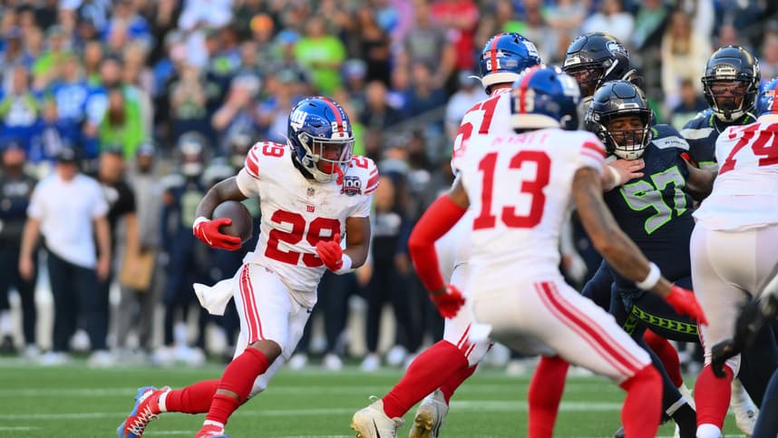 Oct 6, 2024; Seattle, Washington, USA; New York Giants running back Tyrone Tracy Jr. (29) carries the ball against the Seattle Seahawks during the second half at Lumen Field. Mandatory Credit: Steven Bisig-Imagn Images