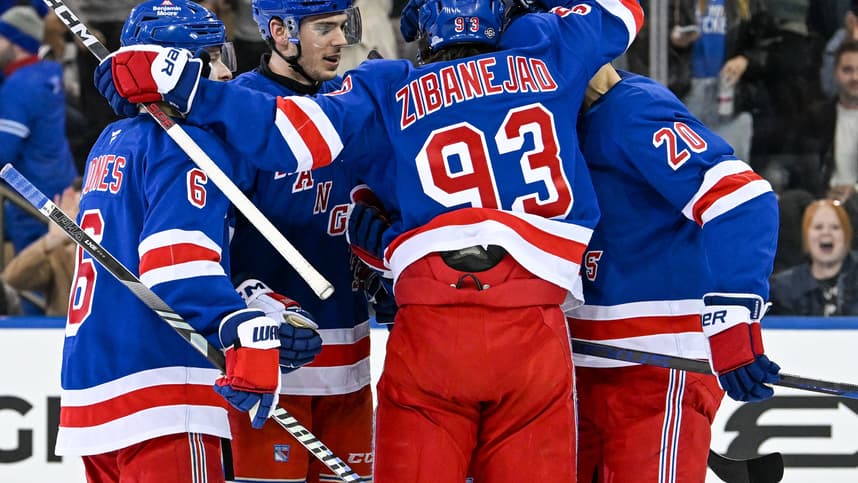 Oct 14, 2024; New York, New York, USA;  New York Rangers celebrate the goal by New York Rangers right wing Reilly Smith (91) against the Detroit Red Wings during the third period at Madison Square Garden. Mandatory Credit: Dennis Schneidler-Imagn Images