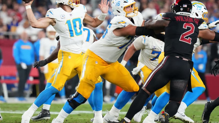 Los Angeles Chargers quarterback Justin Herbert (10) throws the ball against the Arizona Cardinals at State Farm Stadium in Glendale on Oct. 21, 2024.