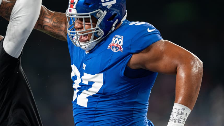 Sep 26, 2024; East Rutherford, NJ, US; New York Giants defensive tackle Dexter Lawrence II (97) celebrates with his coach during pre-game at MetLife Stadium. Mandatory Credit: Julian Guadalupe-NorthJersey.com