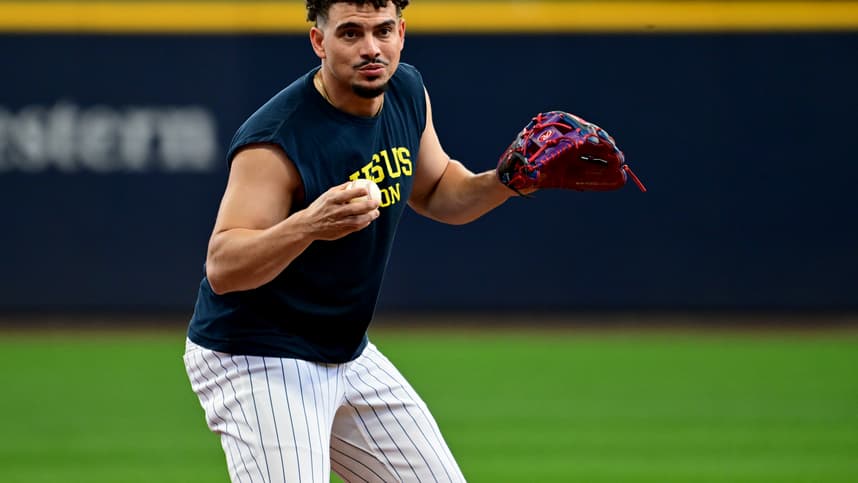 Oct 2, 2024; Milwaukee, Wisconsin, USA; Milwaukee Brewers shortstop Willy Adames (27) warms up before game two of the Wildcard round for the 2024 MLB Playoffs against the New York Mets at American Family Field. Mandatory Credit: Benny Sieu-Imagn Images