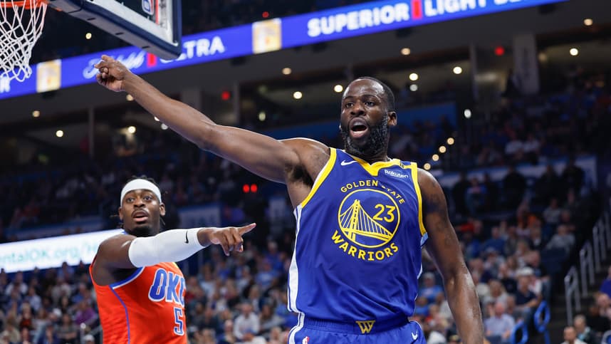 Nov 10, 2024; Oklahoma City, Oklahoma, USA; Golden State Warriors forward Draymond Green (23) and Oklahoma City Thunder guard Luguentz Dort (5) react after a play during the second quarter at Paycom Center. Mandatory Credit: Alonzo Adams-Imagn Images