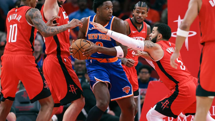 Nov 4, 2024; Houston, Texas, USA; New York Knicks forward OG Anunoby (8) attempts to control the ball as Houston Rockets guard Fred VanVleet (5) defends during the first quarter at Toyota Center. Mandatory Credit: Troy Taormina-Imagn Images