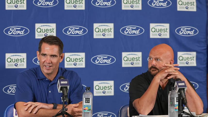 Jul 24, 2024; East Rutherford, NJ, USA; New York Giants general manager Joe Schoen (left) and head coach Brian Dabol talks to media before the start of training camp at Quest Diagnostics Training Facility. Mandatory Credit: Vincent Carchietta-Imagn Images